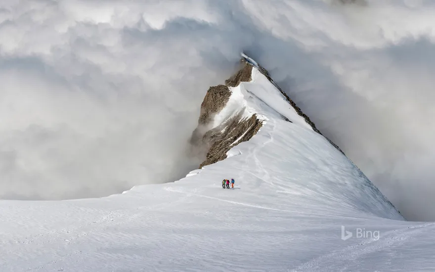 Mountaineers on the Balmhorn in the Bernese Alps of Switzerland