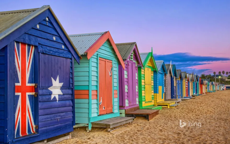 Bathing boxes line the beach at Brighton, Victoria, Australia