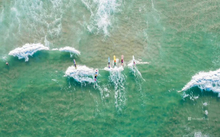 People surfing at Burleigh Heads, Gold Coast, Australia