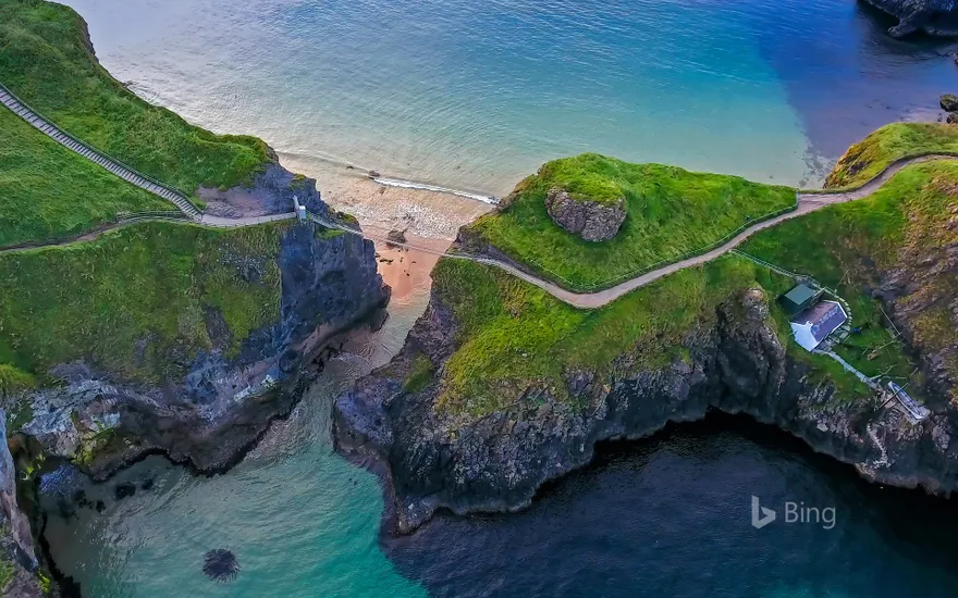 Carrick-a-Rede rope bridge connecting two cliffs near Ballintoy, County Antrim, Northern Ireland
