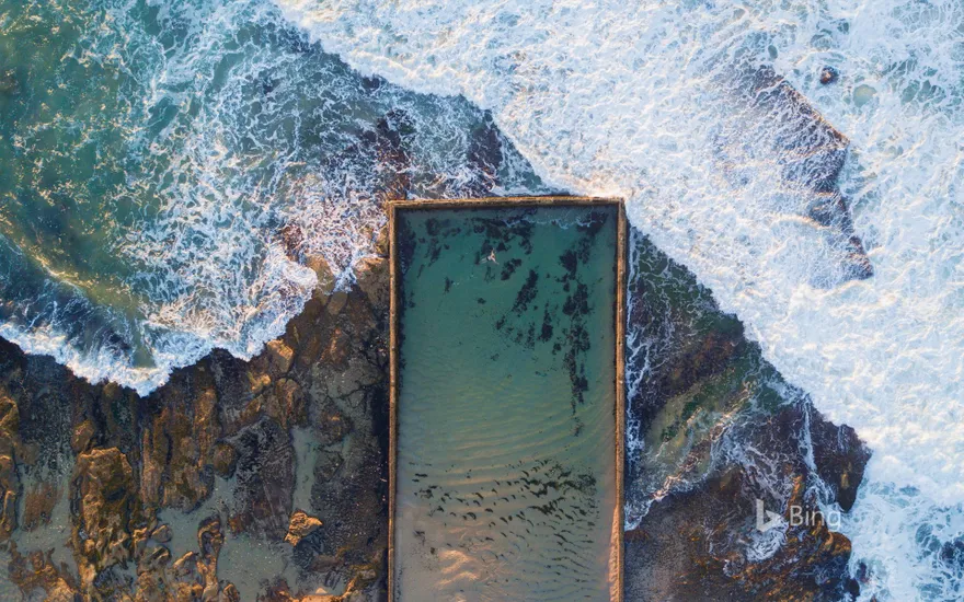 Aerial view of Cronulla rock pool with incoming waves, New South Wales
