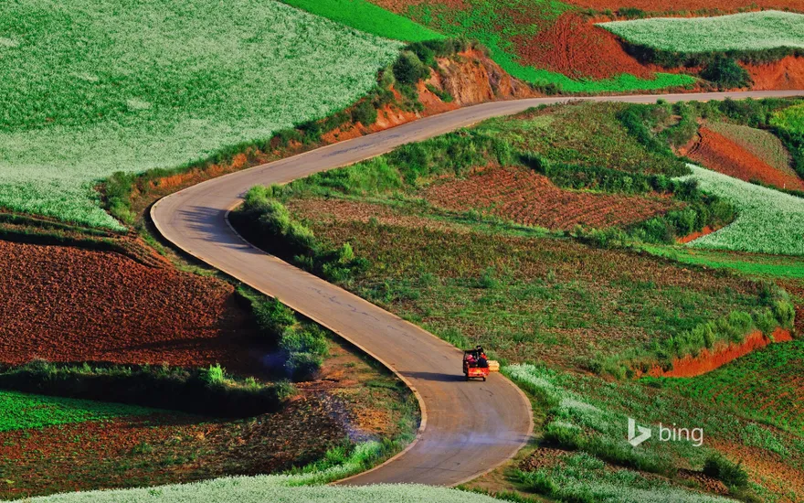 Rolling hills and red earth in Dongchuan, China