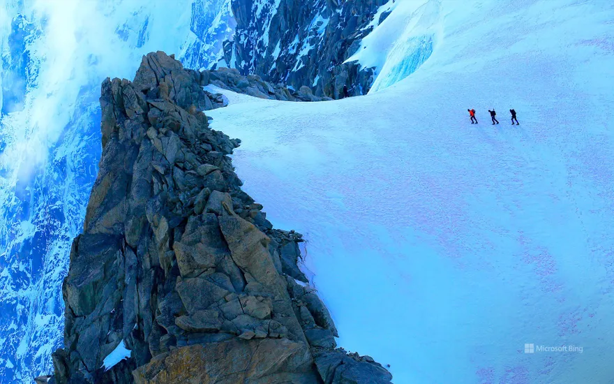 Hikers on alpine glacier, Mont Blanc, Chamonix, France