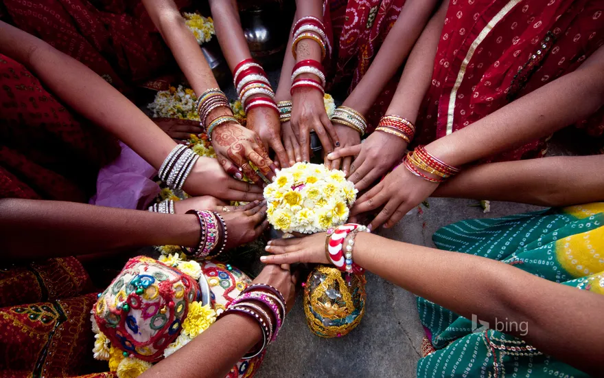 Indian girls praying together