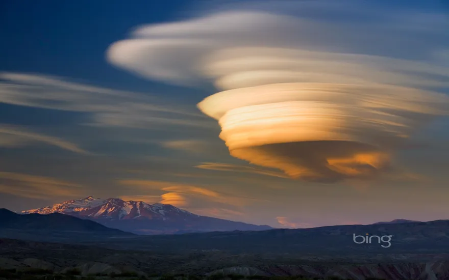 Lenticular cloud over extinct volcano at sunset, Patagonia, Argentina