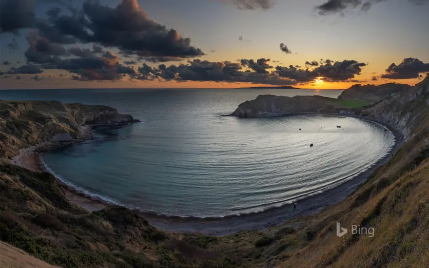 Panoramic view of Lulworth Cove at sunset in Dorset, England