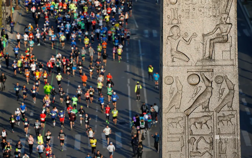Runners during the Paris Marathon, Obelisk at Place de la Concorde, Paris