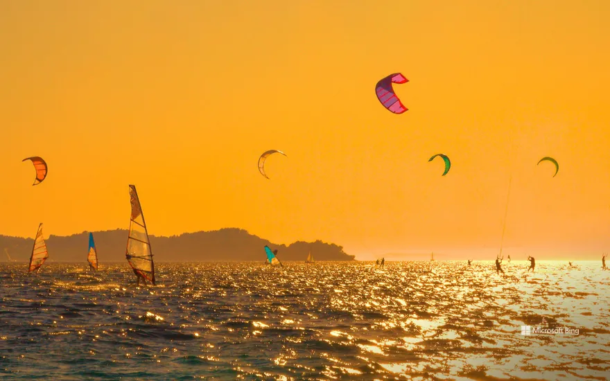 Kiteboarders and windsurfers off the Pelješac Peninsula, Croatia
