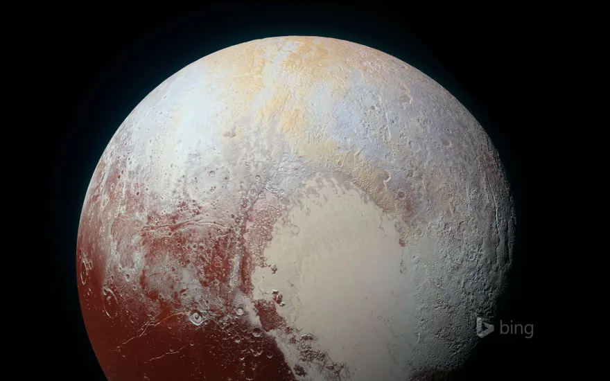 A colour-enhanced photo of Pluto, taken by NASA’s New Horizons spacecraft
