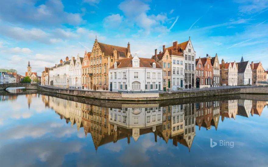 Buildings reflected on the canals of Bruges, Belgium