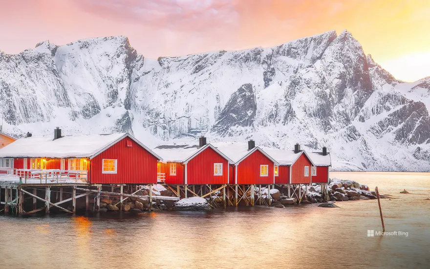 Traditional red fishermen's cabins on the shore of Reinefjorden, Norway