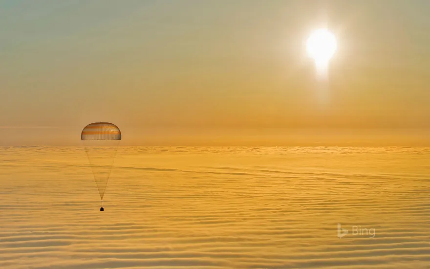 A Soyuz descent module returns to Earth