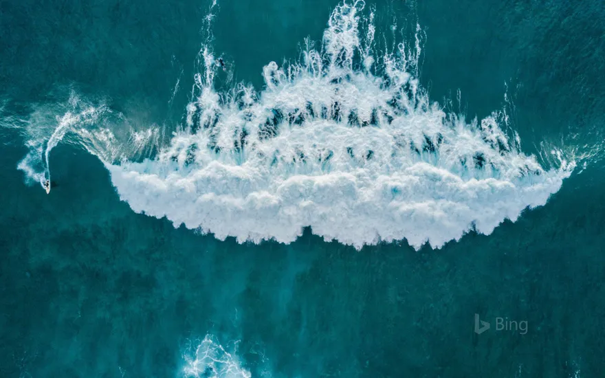 Aerial view of surfer catching a wave, Tenerife, Canary Islands, Spain