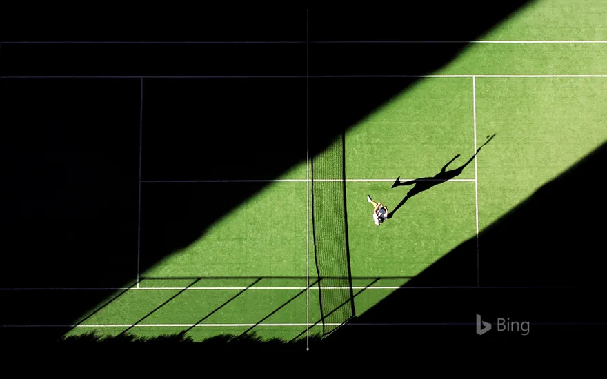 An aerial shot of a tennis match for the opening day of the 2019 Wimbledon Championships