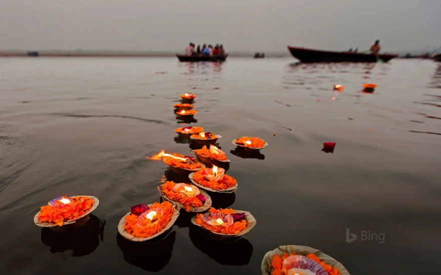 Candles floating in the Ganges River, Varanasi, India