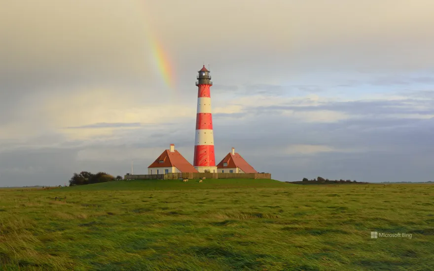 Rainbow over the Westerheversand lighthouse, Westerhever, Schleswig-Holstein